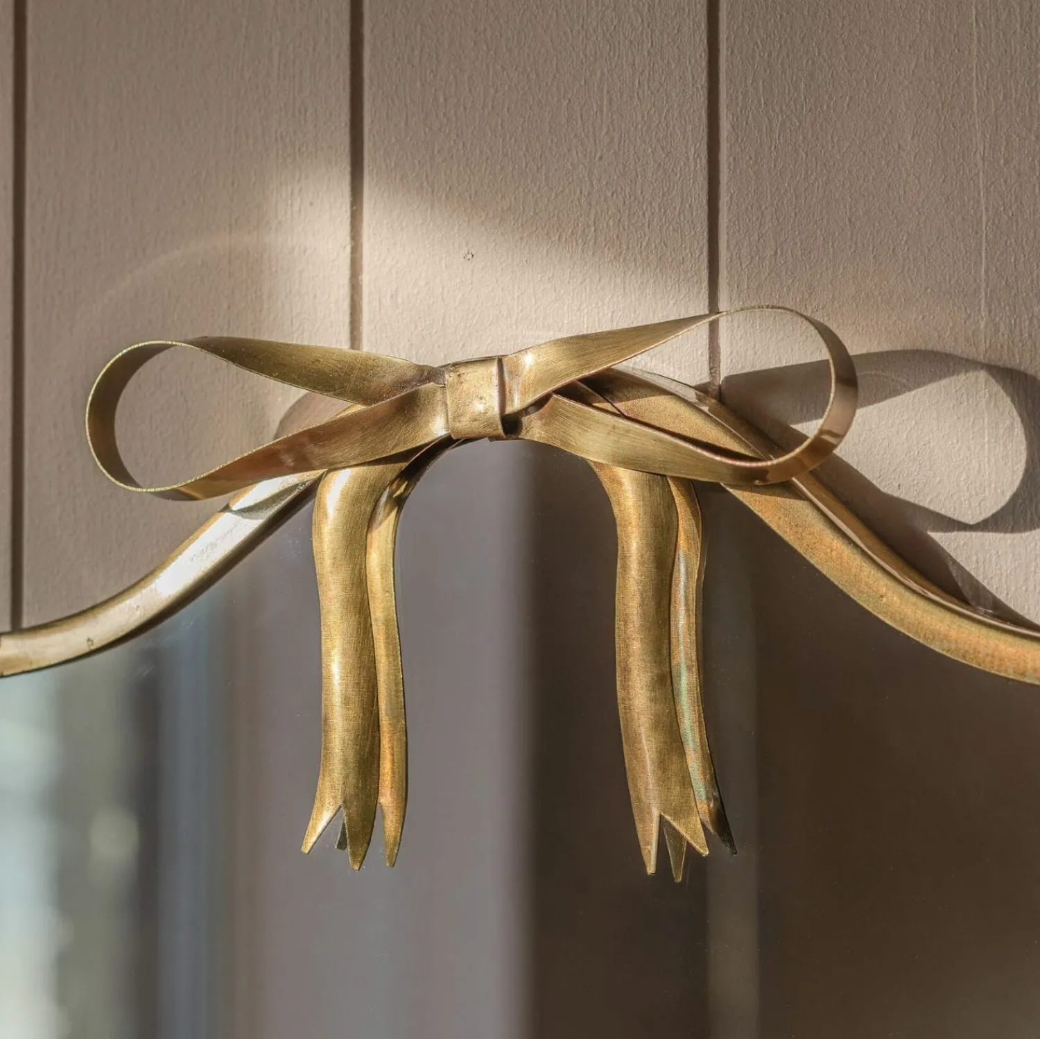 Graham & Green Bow Antique Brass Wall Mirror