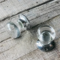 Graham & Green Set of Two Clear Glass and Chrome Flat Globe Door Knobs