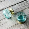 Graham & Green Set of Two Large Round Brass and Aqua Glass Door Knobs